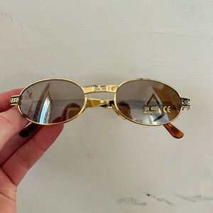 Gold Gucci sunglasses
